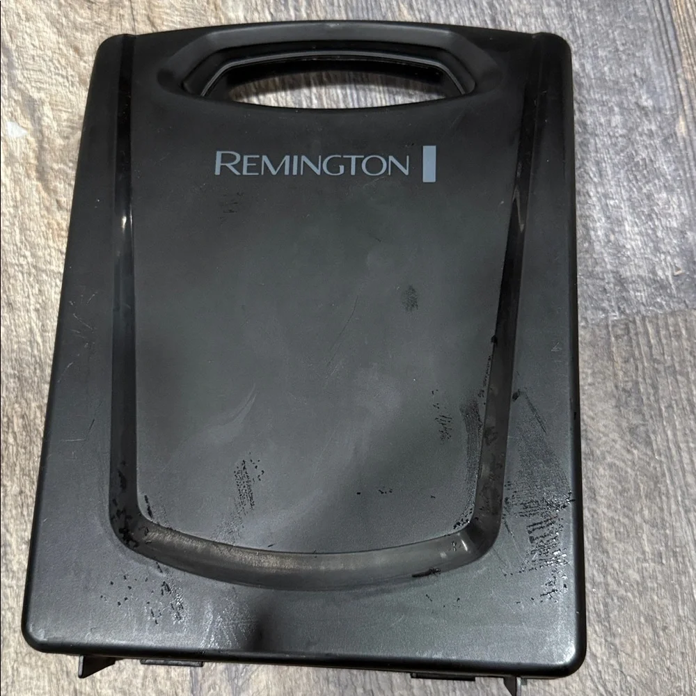 Remington brand haircutting kit, designed for grooming hair and facial hair.